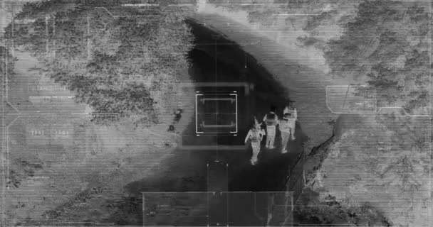 Drone with thermal night vision view of terrorists with camera zooming in — Stock Video