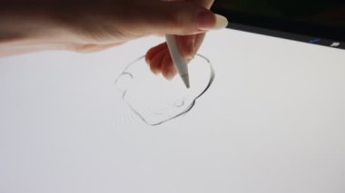 Bir grafik tabletine dijital kalem çizimi kapat