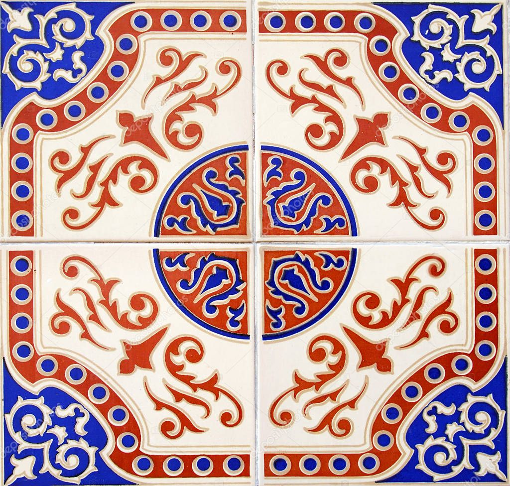 Detail of the traditional tiles from facade of old house. Decorative tiles.Valencian traditional tiles. Floral ornament.