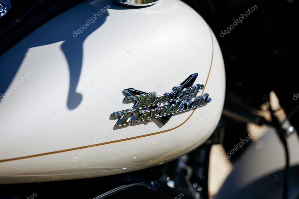 Faaker See, Austria - September 01, 2025: Close-up view of Harley-Davidson Motorcycle emblem on fuel tank highlighting intricate details and craftsmanship