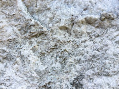 Kabataslak yüzeyi ve ince renk değişimleriyle doğal taş dokusu.