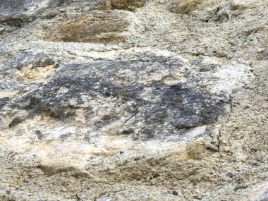 Dokulu desenli doğal kaya yüzeyinin detaylı görüntüsü..