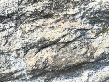 Doğal desenleri olan sert desenli kaya yüzeyine yakın çekim.