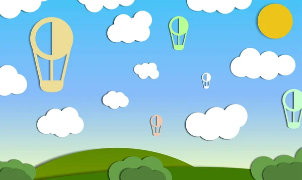 Balonlar kağıttan yapılmış çayırlar üzerinde gökyüzünde
