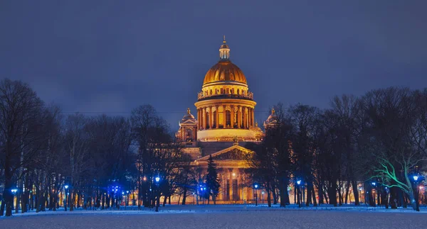 Winter Saint Petersburg. St. Isaac\'s Cathedral in Saint-Petersburg in the Christmas illumination decoration at night . Russia in the winter in the New Year.