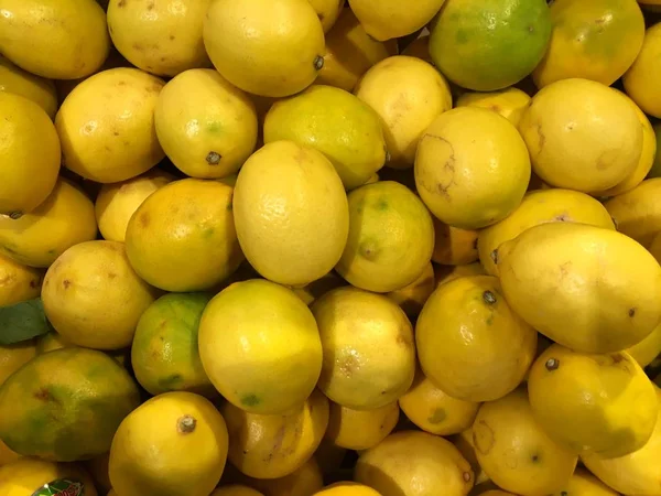 Lemons. Fruit. Fragment from a fruit and vegetable shop