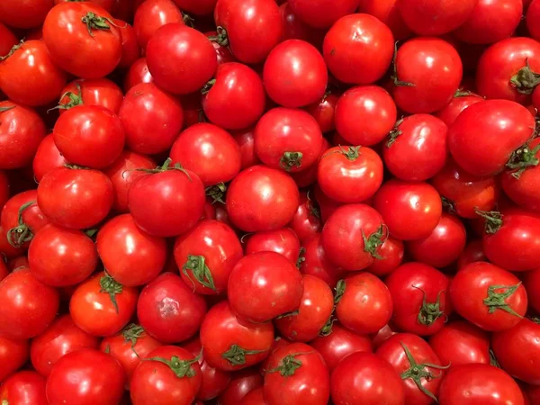 Tomatoes. Vegetables. Fragment from a fruit and vegetable shop