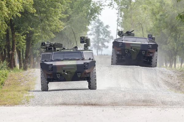 German light armoured  reconnaissance vehicle drives on a road