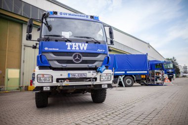 FELDKIRCHEN / Germany - JUNE 9, 2018: German technical emergency service truck stands on a platform at open day. Technisches Hilfswerk, THW means technical emergency service. clipart