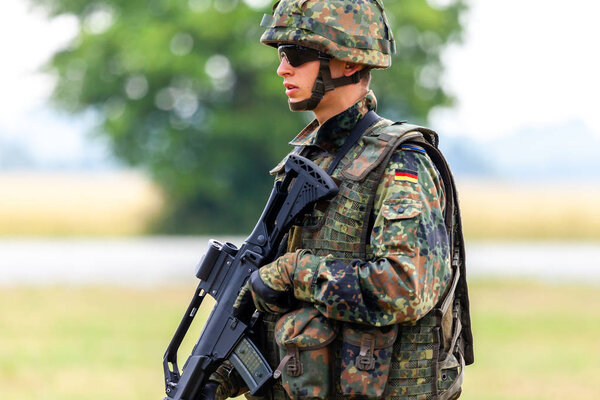 FELDKIRCHEN / GERMANY - JUNE 9, 2018: German soldier on an exercise at open day on day of the Bundeswehr in Feldkirchen