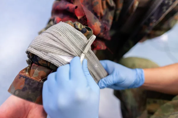 Paramedic Soldier Creates Bandage Make Fracture — Stock Photo, Image