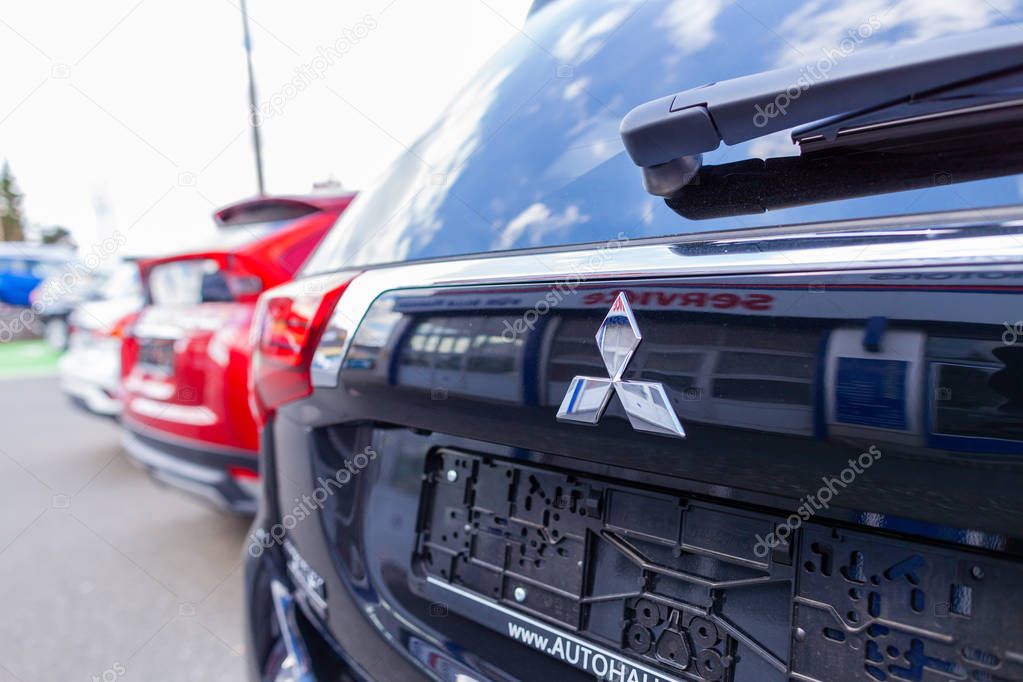 NUREMBERG / GERMANY - APRIL 7, 2019: Mitsubishi logo on a Mitsubishi car at a car dealer. Mitsubishi Motors Corporation is a Japanese multinational automotive manufacturer headquartered in Japan.