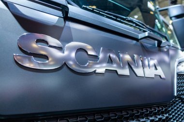 MUNICH / GERMANY - APRIL 14, 2019: Scania branch on a Scania truck. Scania AB is a major Swedish manufacturer of commercial vehicles - specifically heavy trucks and buses. clipart