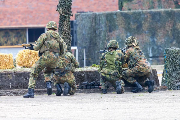 German soldiers with weapons during a tactical demonstration