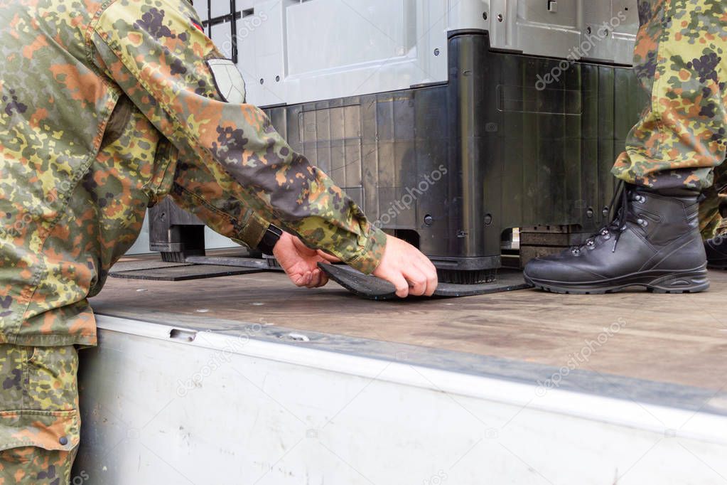 German army soldier lashed cargo with lashing material