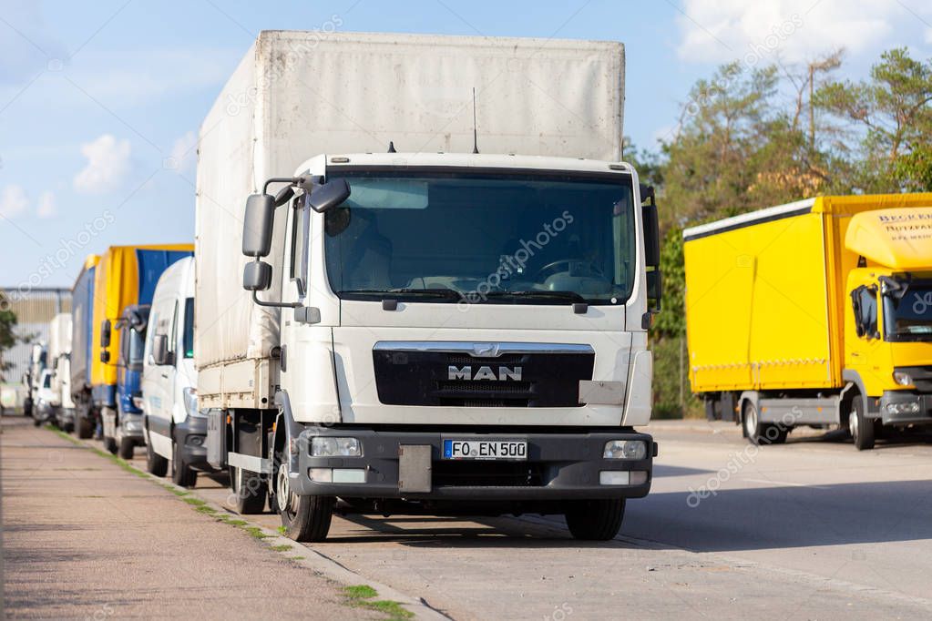 NUREMBERG / GERMANY - AUGUST 4, 2019: Man truck from a forwarder company stands on a street.