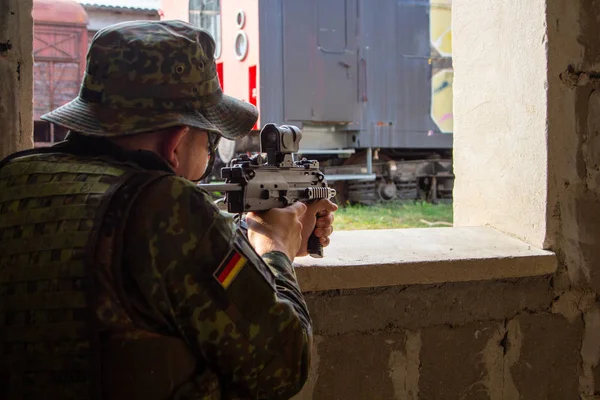 German soldier with a gun at military training area