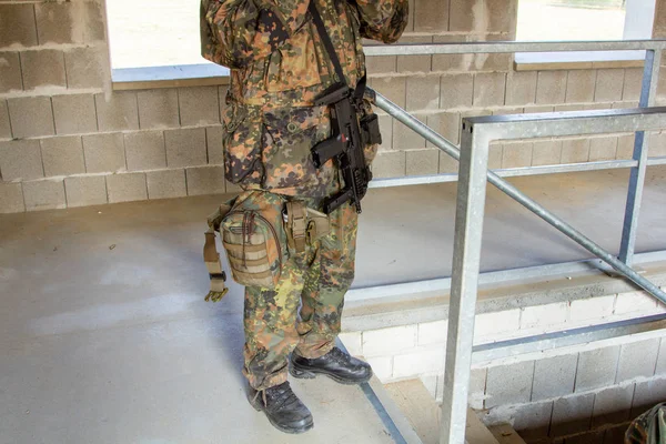 German soldier with a gun at military training area