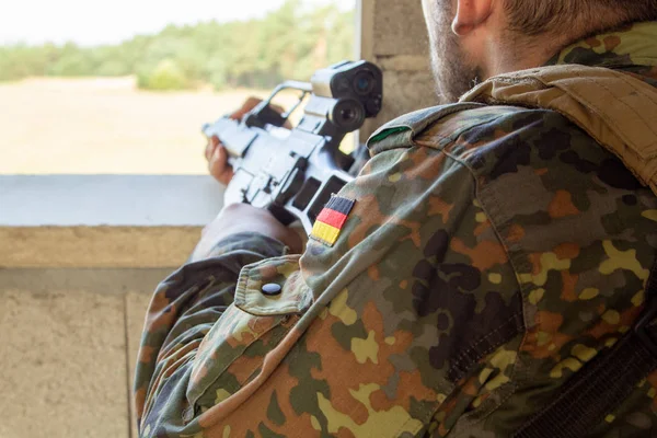 German soldier with a gun at military training area