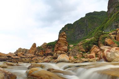 Coastal rock formations in Nanya, Northeast Coast National Scenic Area, Taipei Taiwan. clipart