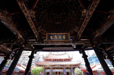 Lungshan Temple, built in the 1700s honors both Buddhist and Taoist deities in Taipei Taiwan
