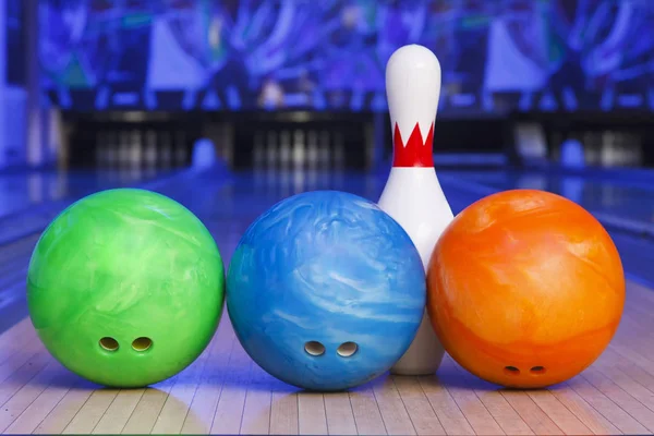 bowling shoes, bowling pins and ball for play in bowling