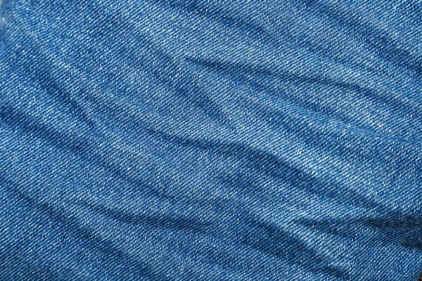 Tekstur Dari Kusut Denim Pakaian Jeans Biru — Stok Foto