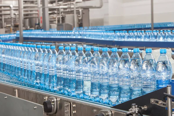 conveyor for bottling water from plastic bottles