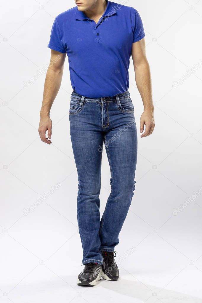 man in jeans, denim pants closeup on white background, blue jeans