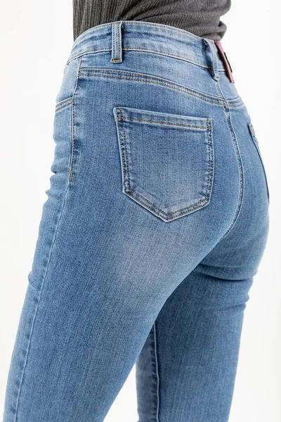 Girl Jeans Shows Jeans Back Pockets White Background Close Blue — Stock Photo, Image