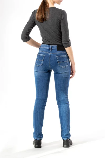 Meisje Jeans Toont Jeans Een Witte Achtergrond Close Blauwe Jeans — Stockfoto