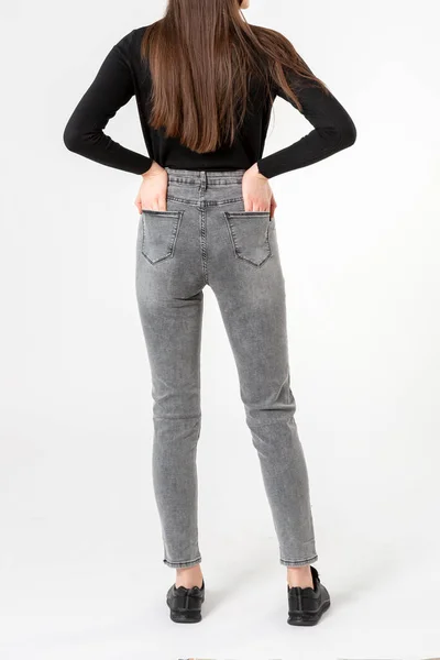 Girl Jeans Shows Jeans White Background Close Gray Jeans — Stockfoto