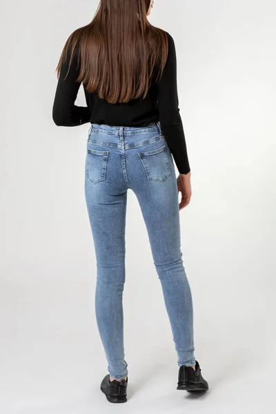 Girl Jeans Shows Jeans White Background Close Blue Jeans — Stock Photo, Image