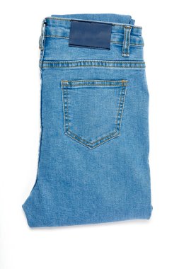 Beyaz arka planda izole kot pantolon, mavi kot pantolon