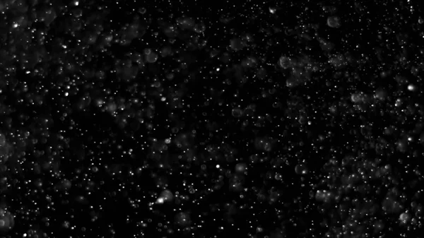 Prachový oblak izolované černým pozadím bublina Bokeh — Stock fotografie