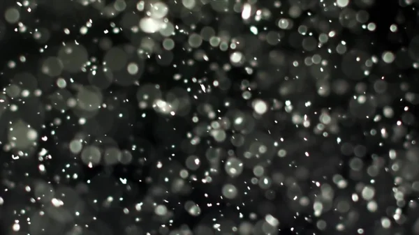 Partículas de polvo retroiluminadas reales con destello de lente real — Foto de Stock