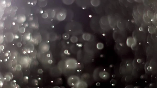 Particelle di polvere retroilluminate reali con riflesso di lente reale — Foto Stock