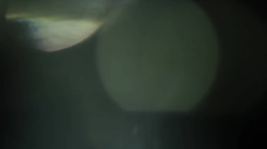 Stüdyoda Siyah Arkaplan Üzerine Gerçek Lens Fişeği Çekimi