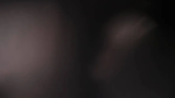 Реальная вспышка объектива в студии на черном фоне Лицензионные Стоковые Фото