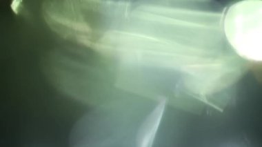 Stüdyoda Siyah Arkaplan Üzerine Gerçek Lens Fişeği Çekimi