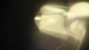 Stüdyoda Siyah Arkaplan Üzerine Gerçek Lens Fişeği Çekimi