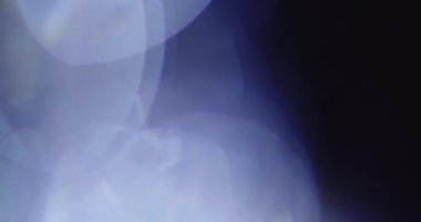 Stüdyoda Siyah Arkaplan Üzerine Gerçek Lens Fişeği Çekimi