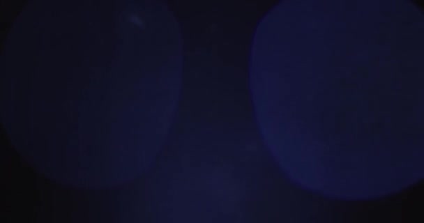 Véritable objectif Flare Shot en studio sur fond noir