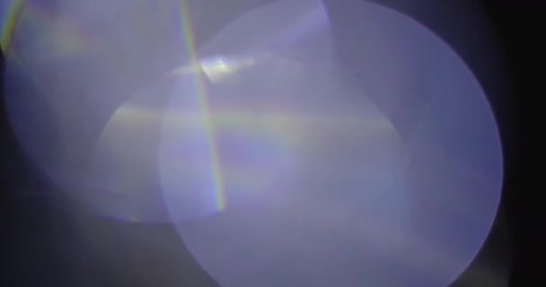 Real Lens Flare Shot in Studio over Black Background — Stock Video