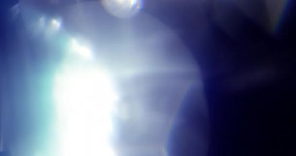 Real Lens Flare Shot in Studio over zwarte achtergrond — Stockvideo