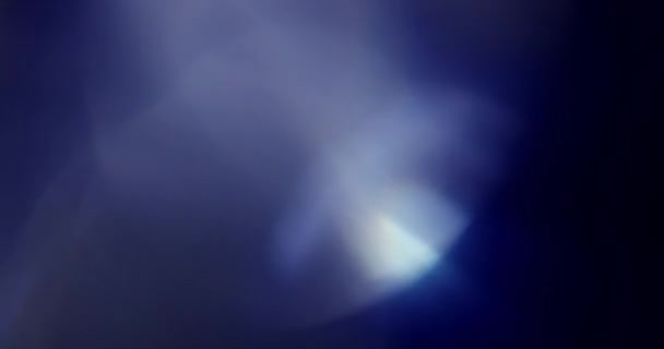 Real objektiv světlice pořízena ve studiu nad černým pozadím — Stock video