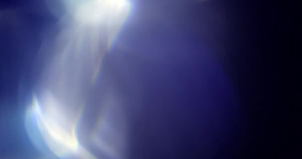 Real Lens Flare Shot in Studio over Black Background — Stock Video