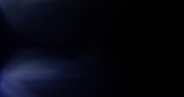 Stüdyoda Siyah Arkaplan Üzerine Gerçek Lens Fişeği Çekimi