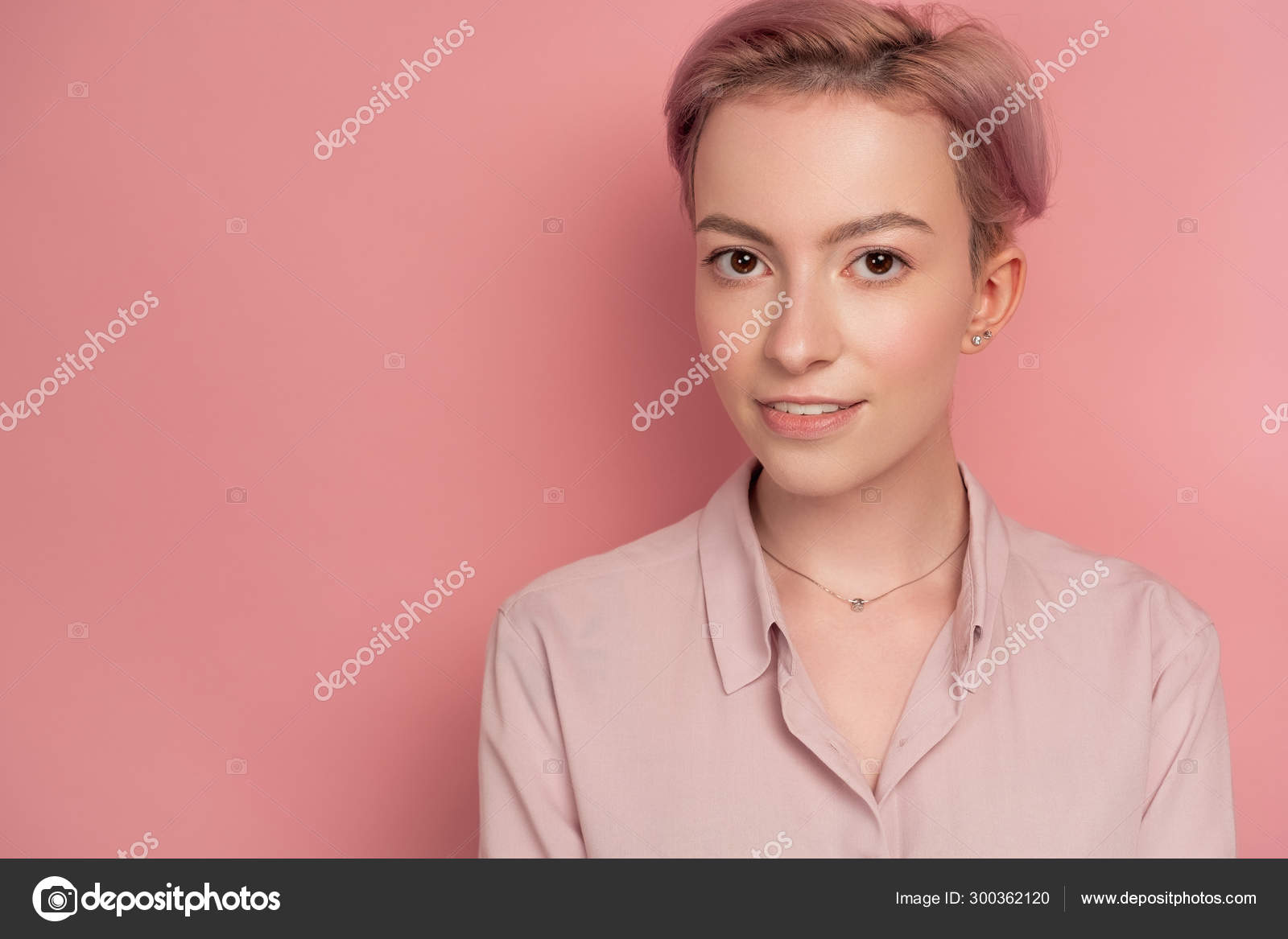 Portrait Of A Girl With Short Pink Hair And Brown Eyes In A Blouse