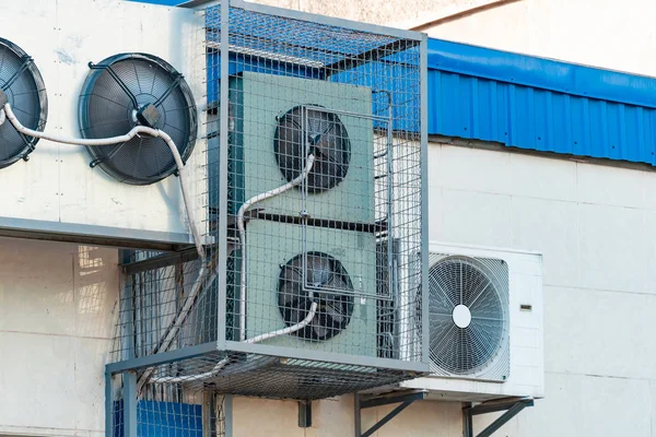 Industrial air conditioning on a high-rise building, the concept of warmth, coolness and comfort